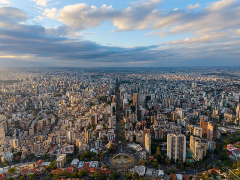 Stunning aerial view of Belo Horizonte, Brazil, showcasing urban landscape and dramatic sky.